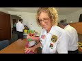 pbso volunteer unit fills backpacks with school supplies.