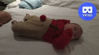 [VR180 5.7k] Baby Riley wearing a cute reindeer suit | Vuze XR 180° 3D