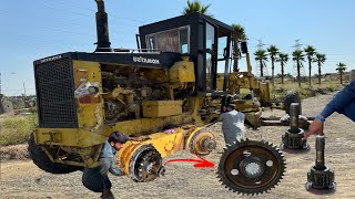 The shaft and gear inside the caterpillar wheel tandem is broken in the desert.