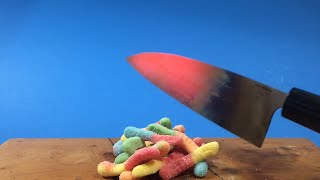 1000 DEGREE KNIFE vs. GUMMY WORMS *satisfying experiment*