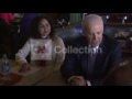 ia biden chats with people in restaurant