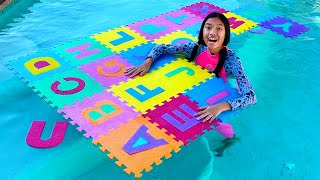 Wendy and Eric Learning ABCs with Summer Alphabet in Swimming Pool