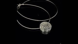 Carrot flower embossed silver bead necklace by Inga Reed at DesignYard Contemporary Jewellery