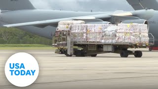 Tonga receives first aid supplies carrying fresh water, generators | USA TODAY