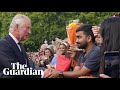 King Charles III greets crowds outside Buckingham Palace