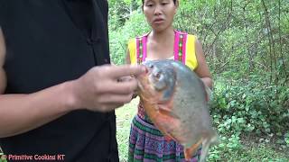 Primitive Technology - catch big fish by primitive skills and cooking fish - eating delicious