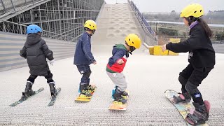 GLOBALink | Kids trying out skiing on dry slopes in Sichuan, China