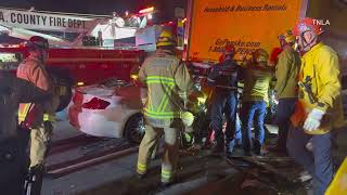 Dramatic Rescue from Car Wedged under Truck