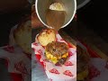 tasty double cheeseburger with onion gravy