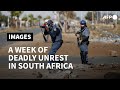 A week of deadly unrest in South Africa | AFP