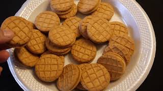 These are Round Nutter Butter - peanut butter sandwich cookies