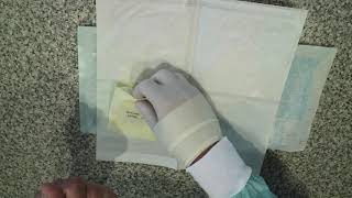 Basic techniques in veterinary surgery - open gloving