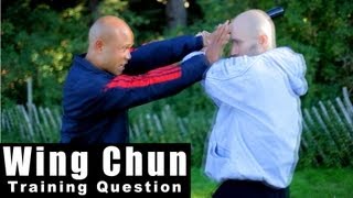Wing Chun training - wing chun how to deal with a weapon surprise attack Q44