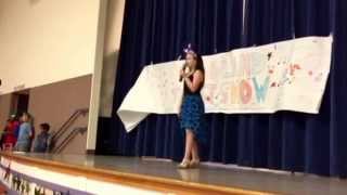 The kiddo performing at the annual talent show. Third year in a row. From a shy little girl to this