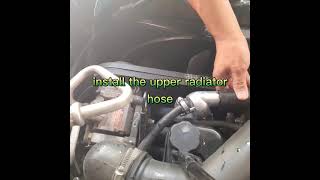 Isuzu 4JA1-T, thermostat and housing installation