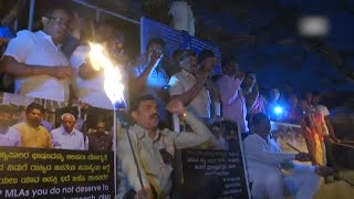 Congress workers stage torchlight protest against BJP’s ‘behavior’ in Karnataka Assembly