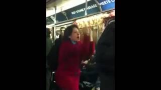 Female On Subway Has Exorcist Inner Rage Spasm On Passenger!