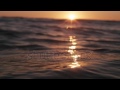 sea surface from underwater at sunset in slow motion. shot video footage shutterstock