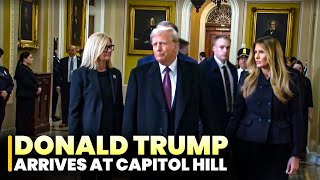 US President-elect Trump arrives at the Capitol for viewing of Carter's casket