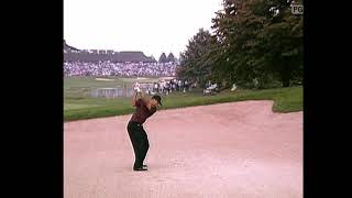 Tiger from fairway bunker