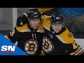 Brad Marchand fights off two Penguins before teeing up Torey Krug