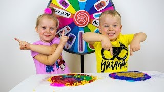 Mystery Wheel Slime Challenge with Gaby and Alex