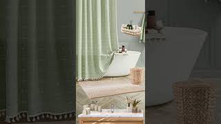 Bathroom Ideas: Creating a Serene Bathroom Oasis with a Green Shower Curtain and Beige Jute Accents