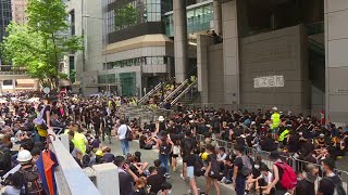 Thousands converge on Hong Kong police HQ in anti-govt demo | AFP