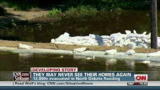 CNN: Thousands flee North Dakota floods