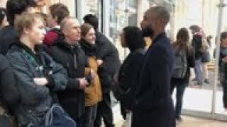 Tension as climate activists confront shoppers in Paris