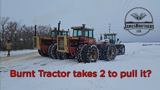 Pulling Burnt 865B to shop with 2 Versatile 4wd tractors!