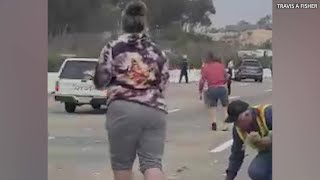 Drivers Stop To Scoop Up Cash On Freeway In Carlsbad