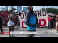 large protest erupts at christopher columbus statue in grant park