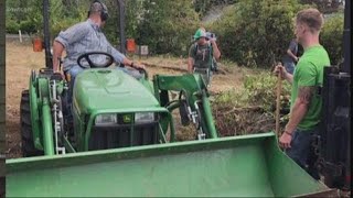 Oregon State Police help to clean yard of 90-year-old woman