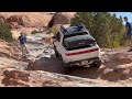 rivian r1t off road rock crawl at moab