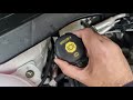 How to check brake fluid level in Kia Sportage