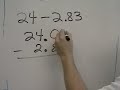 subtracting decimals from a whole number