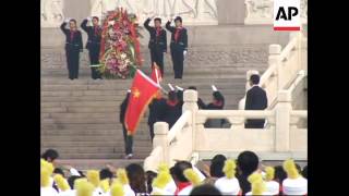 8-yr-olds mark coming of age by receiving red scarves from Communist party