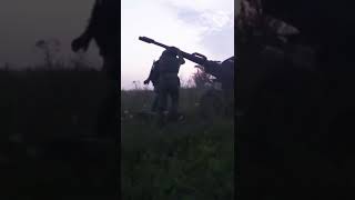 Ukrainian servicemen fire against Russian troops in Kharkiv
