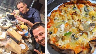 RECORD du MONDE! Je goûte sa PIZZA aux 257 FROMAGES! - VLOG #966