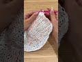 crocheting a top out of plastic bags...