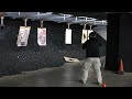 an atf officer fires an ak 15 modified with a machine gun converter