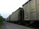 csx 703 42 and rear pusher 7492 head out of the ky river valley near richmond ky