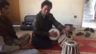 USTAD DILDAR HUSAIN doing riaz at his home.