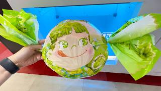 Winning Giant Candy from Claw Machines in Japan