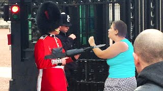 angry Karen tries to mess with a Royal Guard..