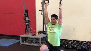 EricCressey.com: Double Kettlebell Bottoms-up Kneeling Overhead Hold to Stand