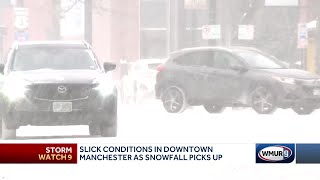 Slick conditions in Manchester as snowfall picks up