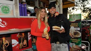 Wanda Nara y L-Gante presentaron su canción en la Costanera con mucho champagne y comiendo choripan