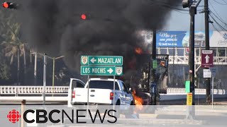 Federal government warns Canadians in Mexico to limit movement amid erupting violence